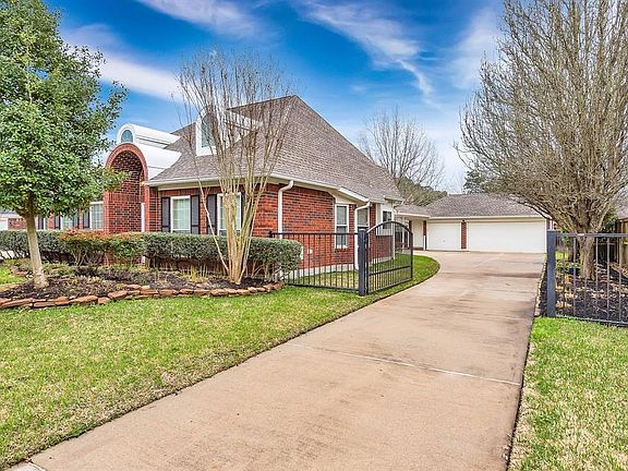 long driveway with automatic gate