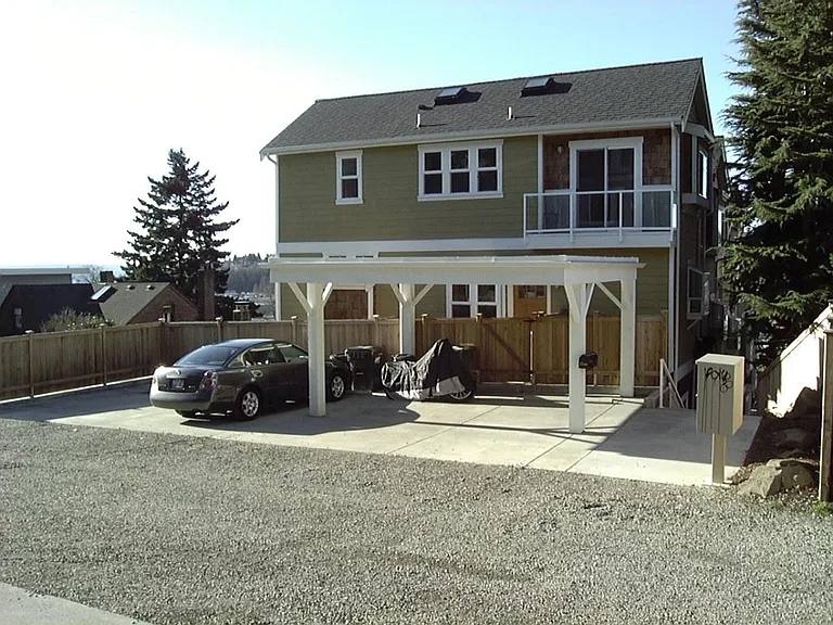 1 covered assigned off street parking space