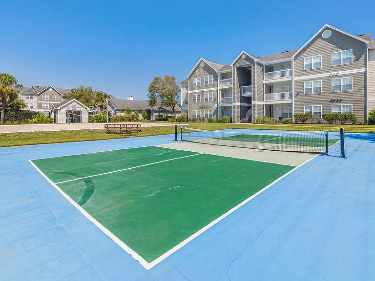 Outdoor Amenities Include a Pickleball and Sand Volleyball Court