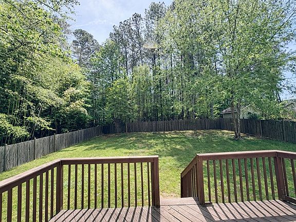 Fenced in backyard and deck