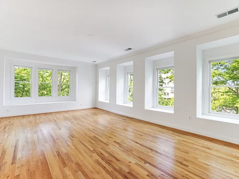 Primary bedroom windows are on two sides. Privacy and views.