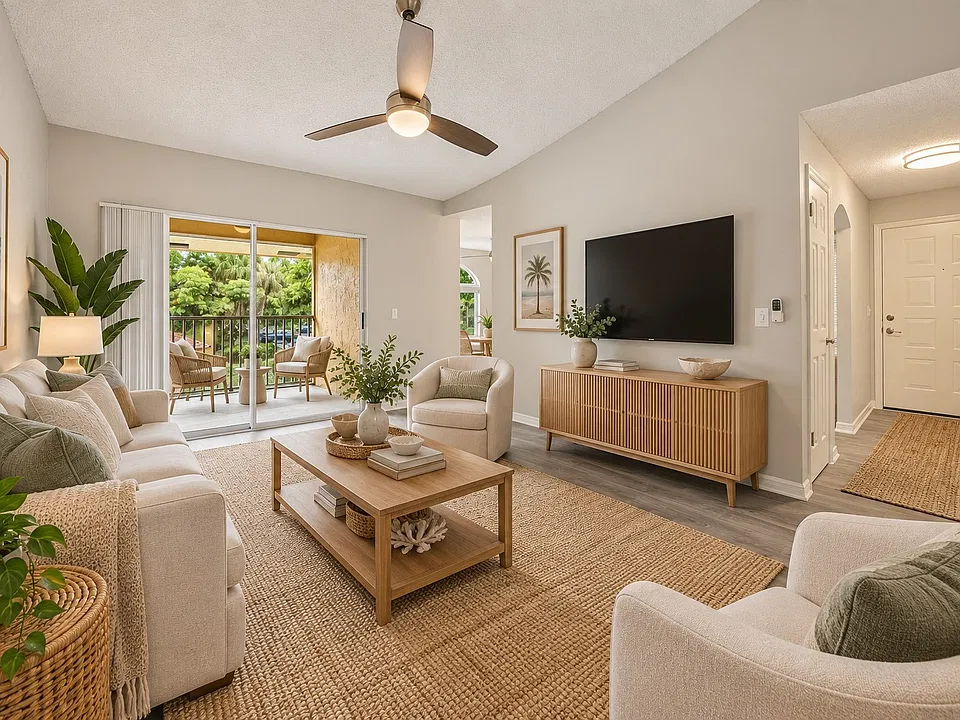 Step into comfort at Indian Hills, where cozy design meets modern living. This inviting living room features a seamless blend of natural light and stylish decor, perfect for relaxation. Explore your new home today!