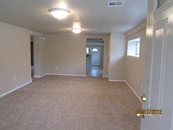 Living Room with New Carpet and 2 Coat Closets