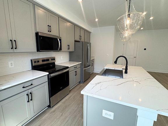 The kitchen of the Amber on homesite 139 at Cascades at Embrey Mil.