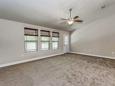 Open concept living room, new luxury vinyl tile installed 2023