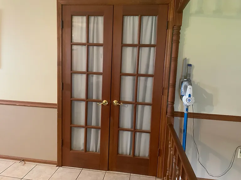 French doors to main bedroom
