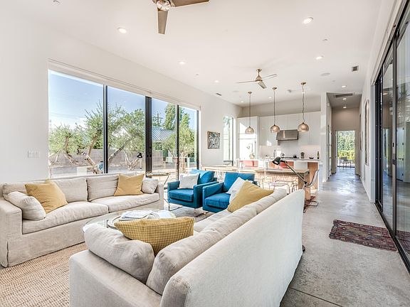 Open living room kitchen with pantry behind