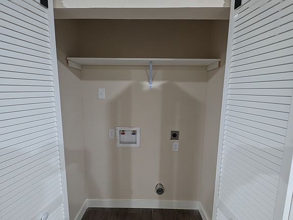 Washer dryer Area with convenient access to living areas.