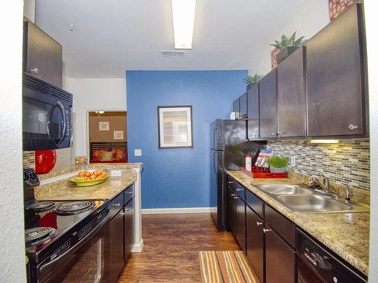 Updated kitchen with modern cabinetry and appliances
