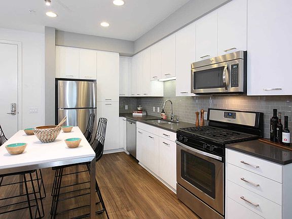 Kitchen with Stainless Steel Appliances and Quartz Counters