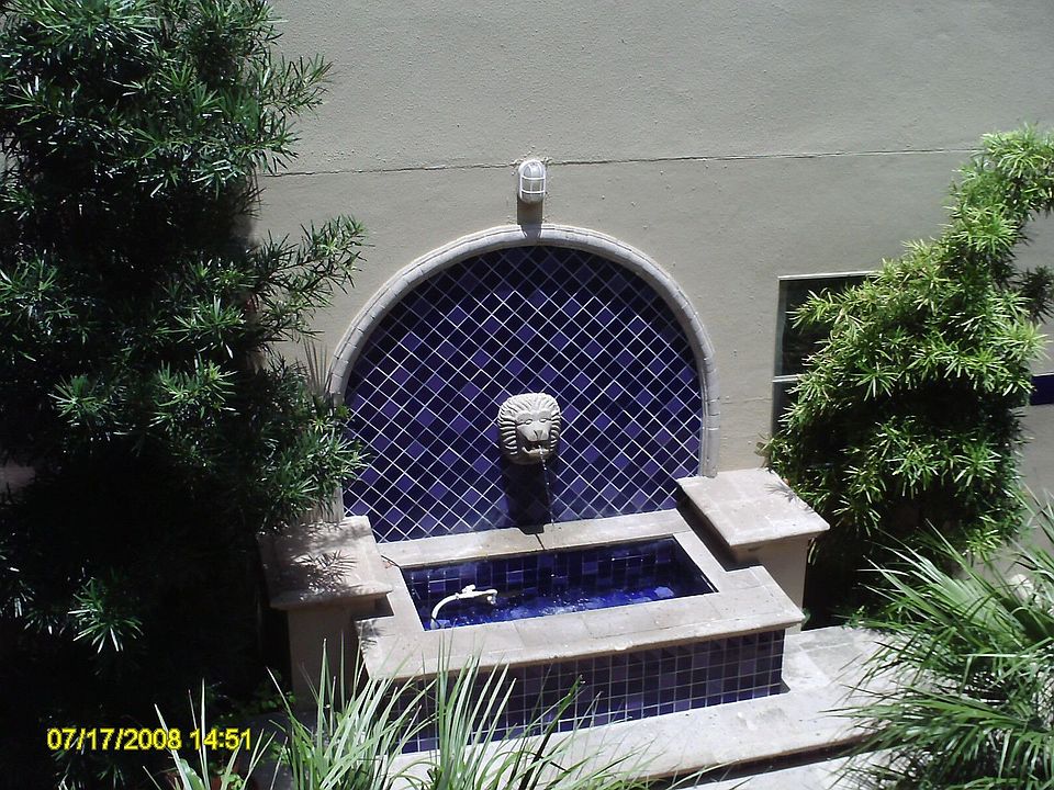 Unit 308 opens to courtyard.