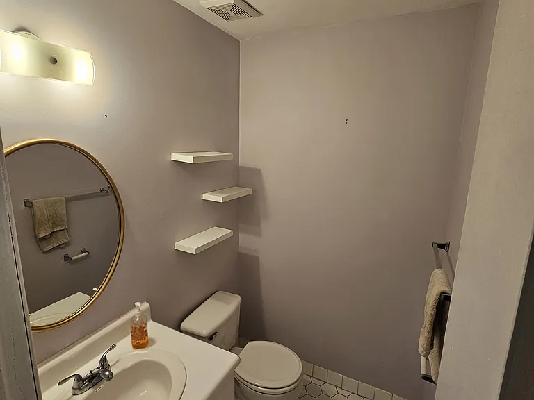 Half Bath - First Floor off the Kitchen