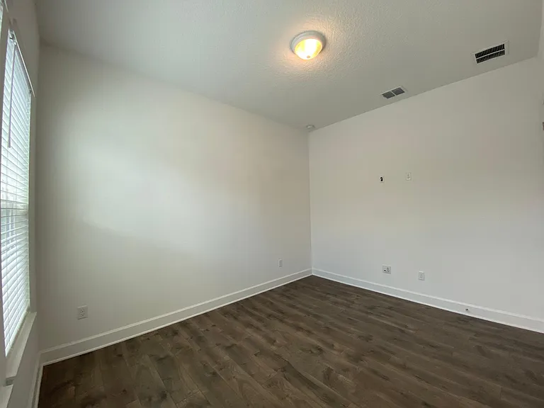 Inside the main room from a different angle. The bedroom TV wall is on the right.