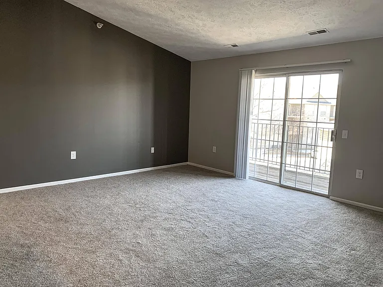 Enjoy your spacious living area with balcony accessperfect for relaxing or entertaining guests.