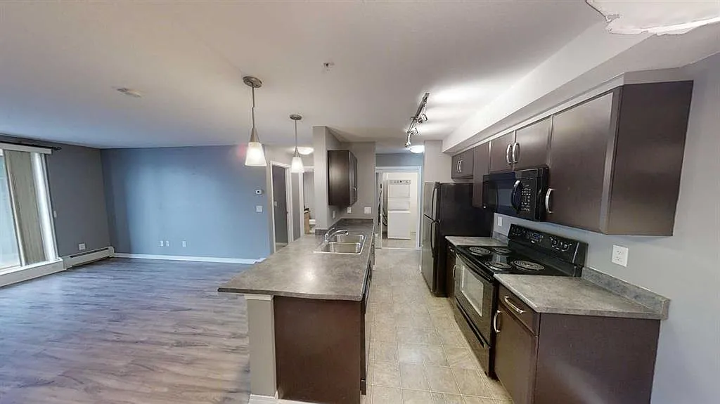 Building Photo - 9124 96th Ave #208