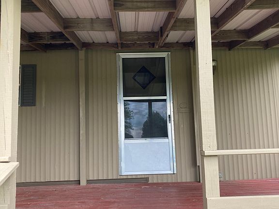 Front entrance with covered deck