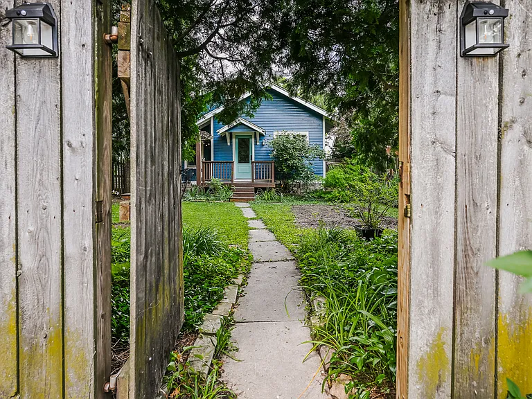 Fenced in backyard - private entrance through backyard driveway.