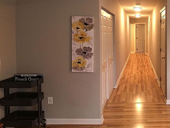 Living area and hallway, laundry closet