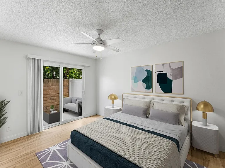 Master bedroom leads to private courtyard.