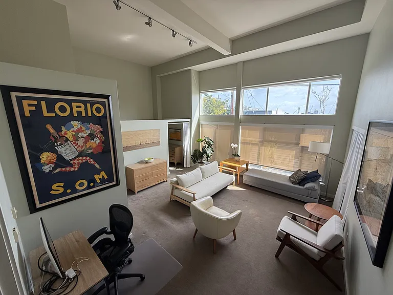 Living Room #2 on separate level w/private deck and lofted ceilings