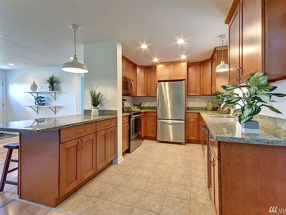 Eating bar completes the U-shaped kitchen.