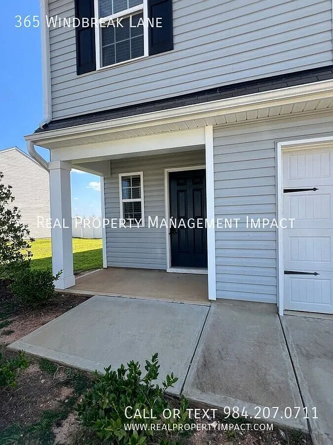 Timeless Elegance Meets Modern Living in this Four-Bed, 2.5-Bath Youngsville Home — Photo 3