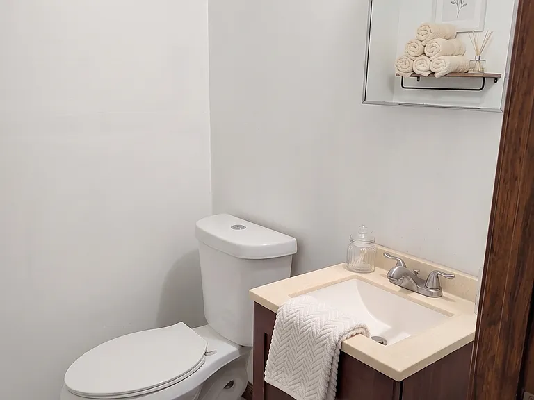 Half-bath accessible from Family Den