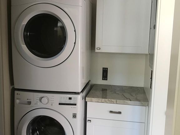 Stacked washer and dryer included