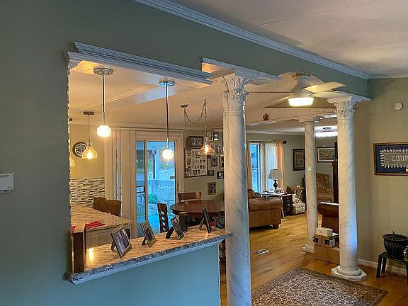 Living room to TV room.