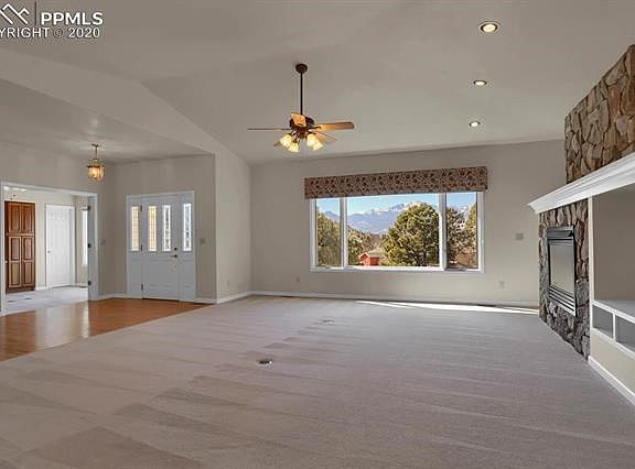living room, entry, and doors to office from kitchen...check out the view!