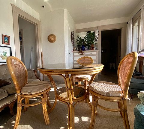 The living/dining room was the original solarium in this home on the Historic Registry of Fresno.
