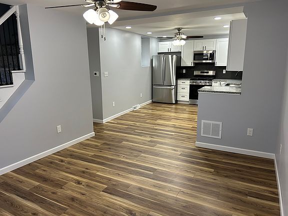 Living room looking into kitchen.