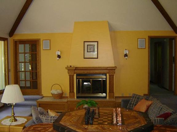 Cozy and comfy, enjoy conversation with family and friends in this sunken living room which is part 