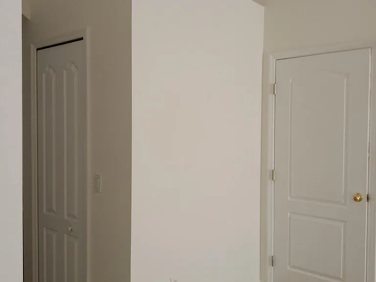 Master bedroom doorway and one of the walk in closet doorways.