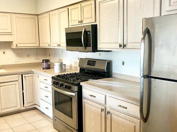 Kitchen w/ Stainless Steel Appliances