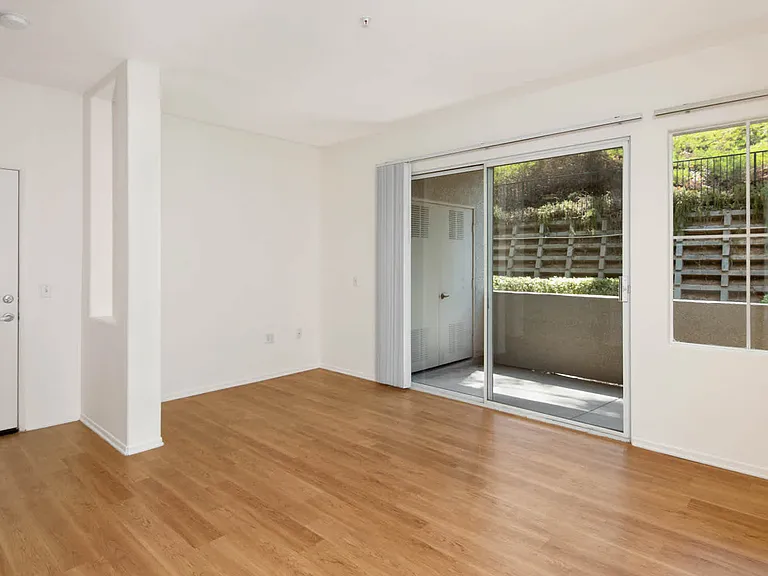 Living Room with Patio and Hard Surface Flooring