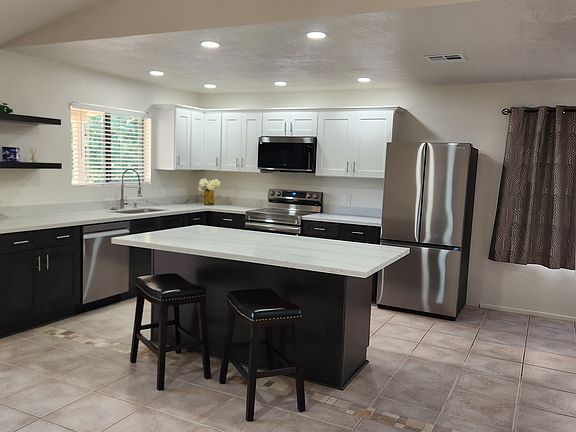 Remodeled Kitchen with Stainless Steel Appliances