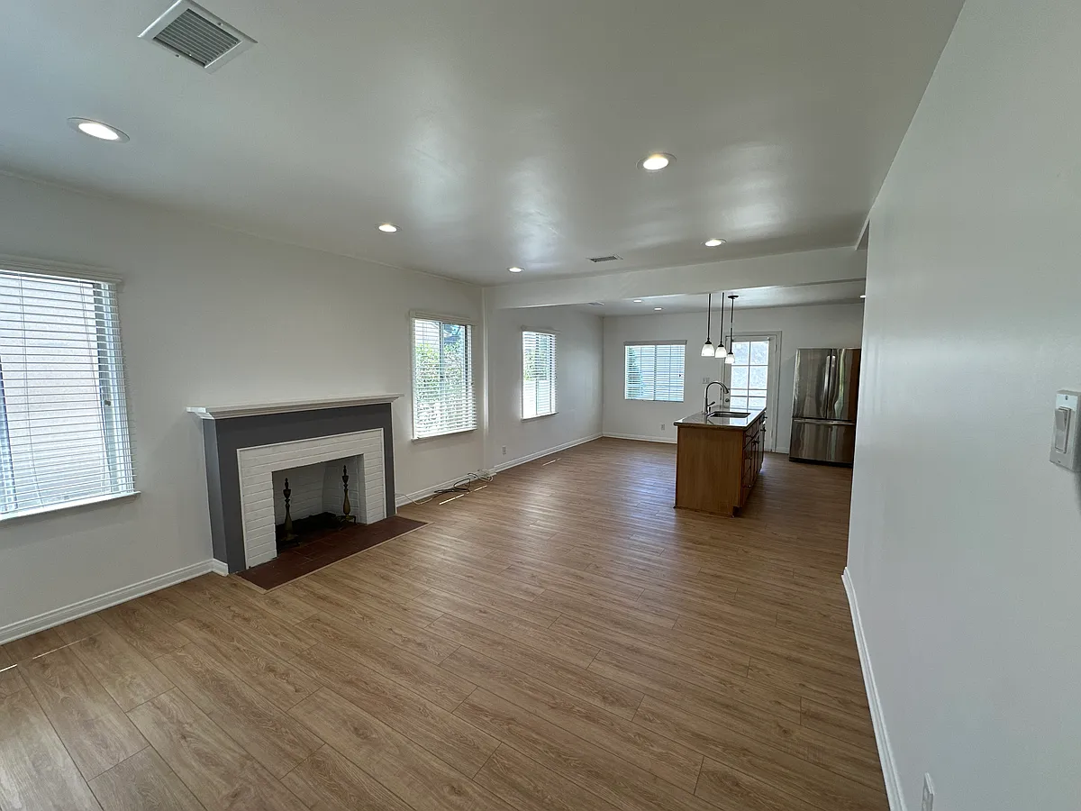 Open floor living space. - 1815 Armacost Ave #A