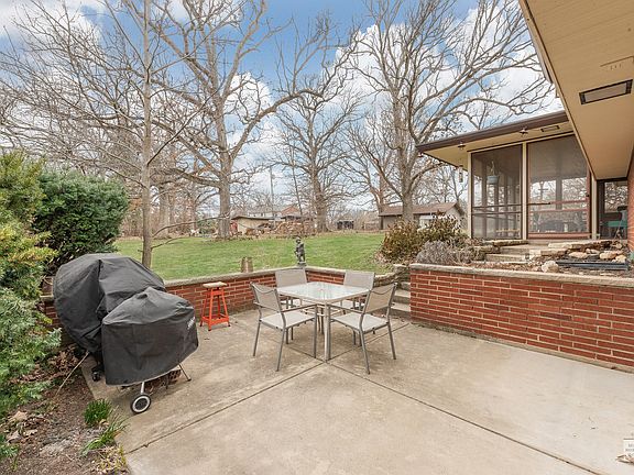 An Herb garden in nestled between the Patio and Screen Room.