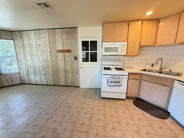 Kitchen area open to dining.