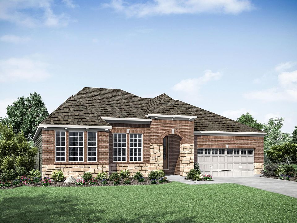 custom home with brick and stone