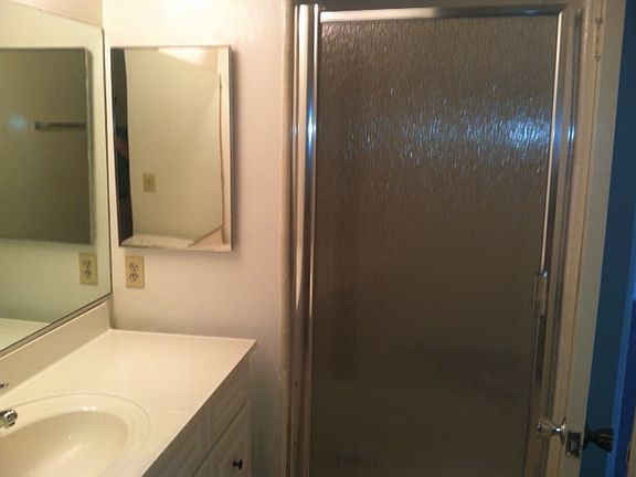 Bathroom features huge shower.