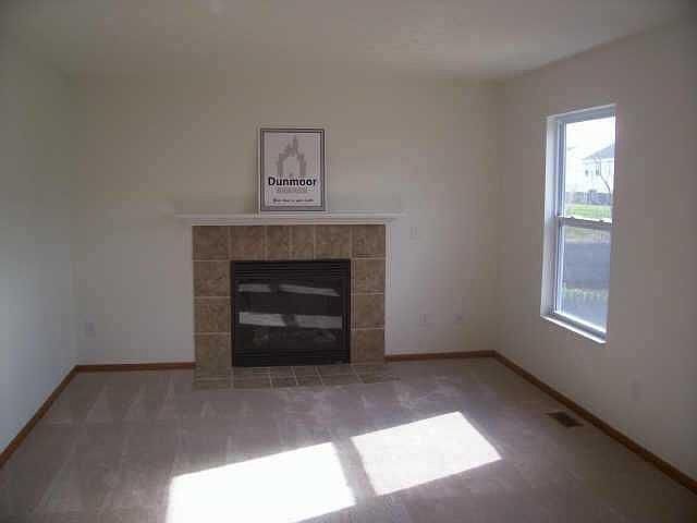 Fireplace warms the family room