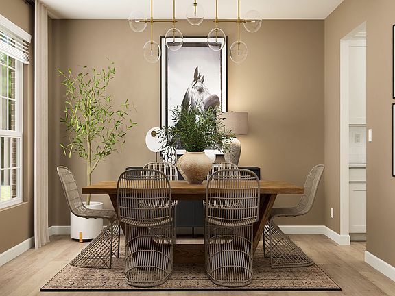 The spacious dining room is ready for all your dinner parties!