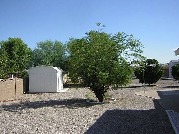 Storage shed at rear