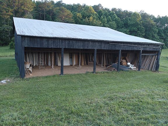 Shed on side of barn