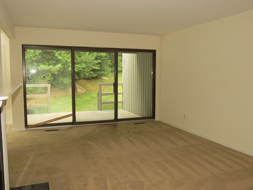 Living Room w/ sliders to covered porch