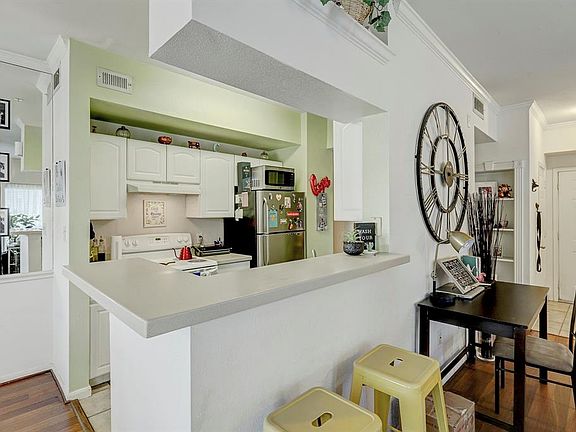 Kitchen is open to the living room and breakfast area