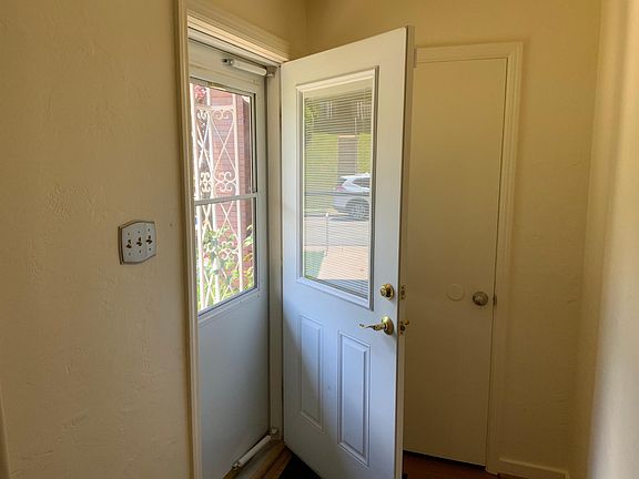 Level entry door. Handy coat closet.