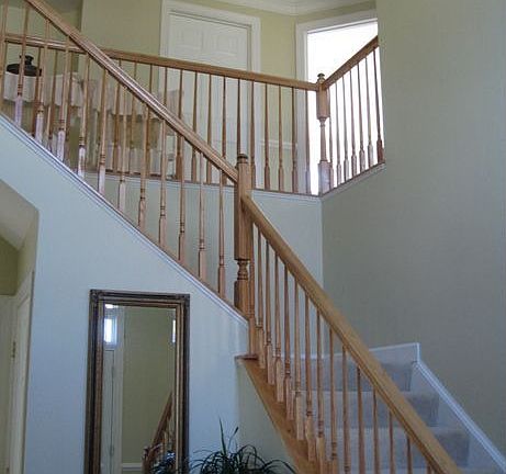 Soaring two story foyer welcomes you home.